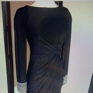 Elegant Black Dress with Embellished Cuffs
